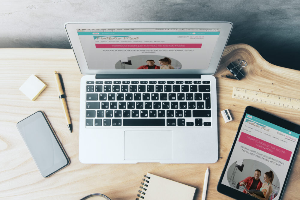 Laptop and tablet preview of Portfolio Mart website redesign